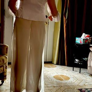 White pants and blouse.